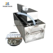 Malý stroj na loupání křepelčích vajec